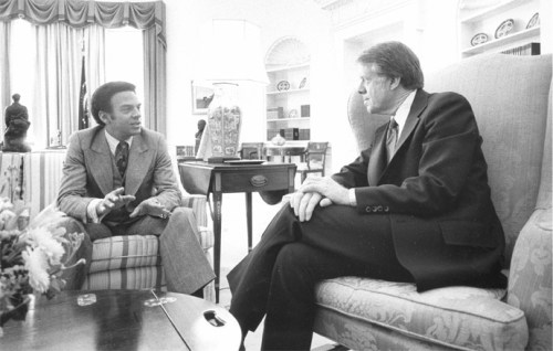 Ambassador to the United Nations Andrew Young meeting with President Jimmy Carter. Young served as ambassador during 1977-1979, but was forced to resign because of an unauthorized meeting with Palestinian diplomats. (Photograph from Still Pictures Unit, National Archives and Records Administration, RG 59-SO, box 39)