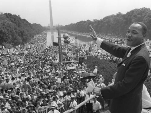 Martin Luther King Jr. waves to supporters on the Mall in Washington, D.C., Aug. 28, 1963. AFP/GETTY IMAGES
