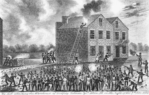 A mob attacking the warehouse of Godfrey & Gilman in Alton, Ill., where the abolitionist Elijah Lovejoy was killed in 1837.Credit Corbis